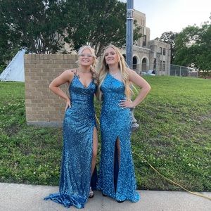 Blue dress on the left only worn once